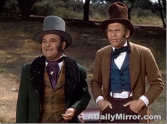 Two comical fellows in stovepipe hats. 